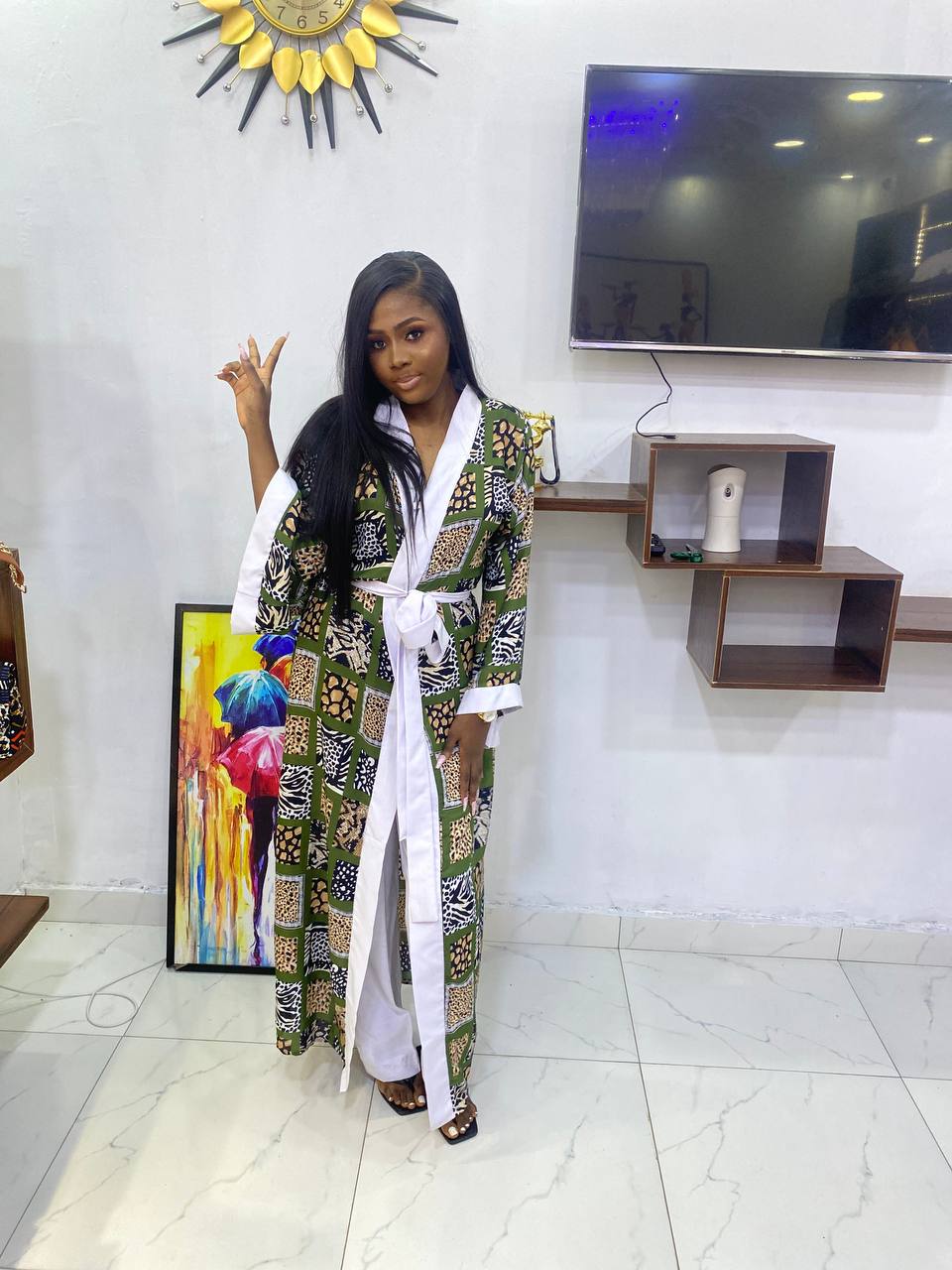 stunning  kimono dress, adorned with luxurious finishings