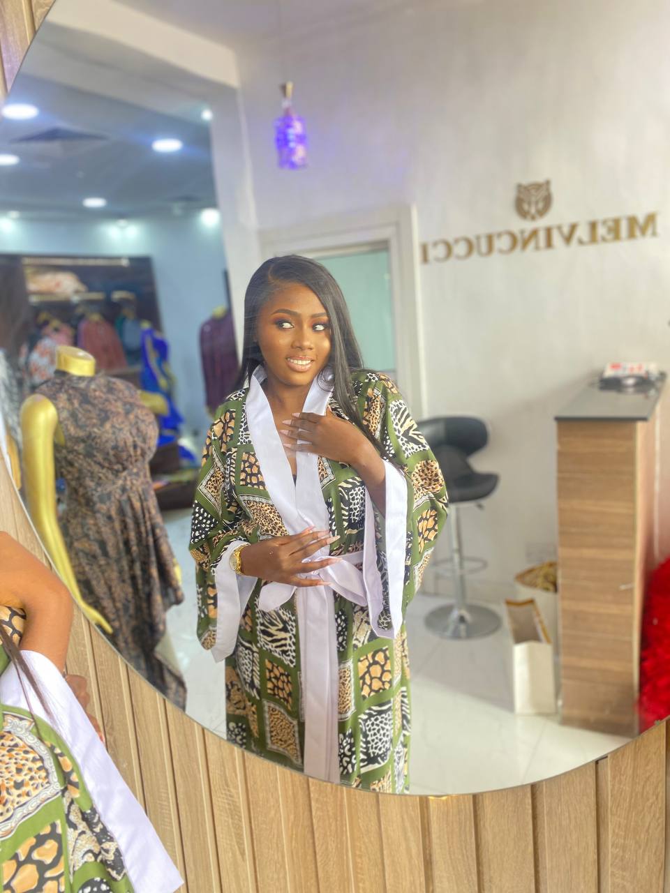 stunning  kimono dress, adorned with luxurious finishings