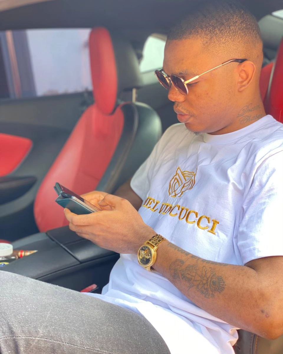 A white, “classic” men solid round neck Tee shirt with melvincucci logo embroidery