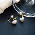 Pearl earrings - melvincucci