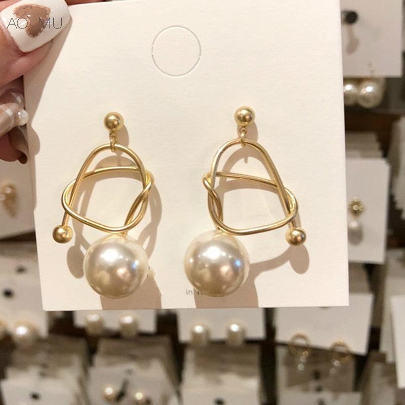 Metal winding personalized pearl earrings - melvincucci