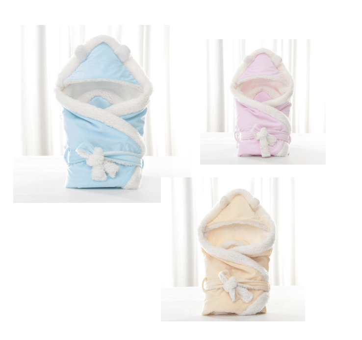 Newborn baby being hugged and swaddled by baby - melvincucci