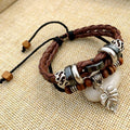 Cross stud braided leather bracelet - melvincucci