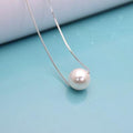 Pearl necklace hanging - melvincucci