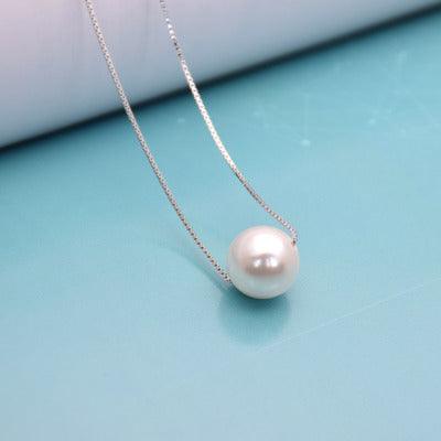 Pearl necklace hanging - melvincucci