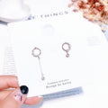 Asymmetrical earrings - melvincucci