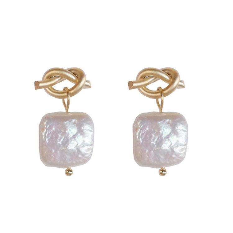 Natural pearl earrings - melvincucci