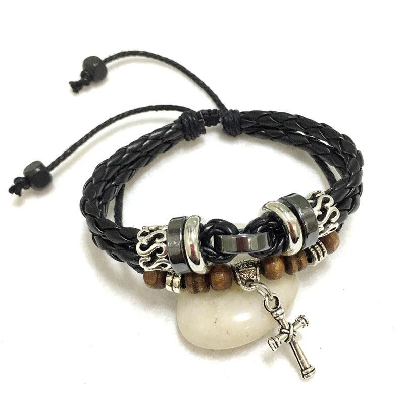 Cross stud braided leather bracelet - melvincucci