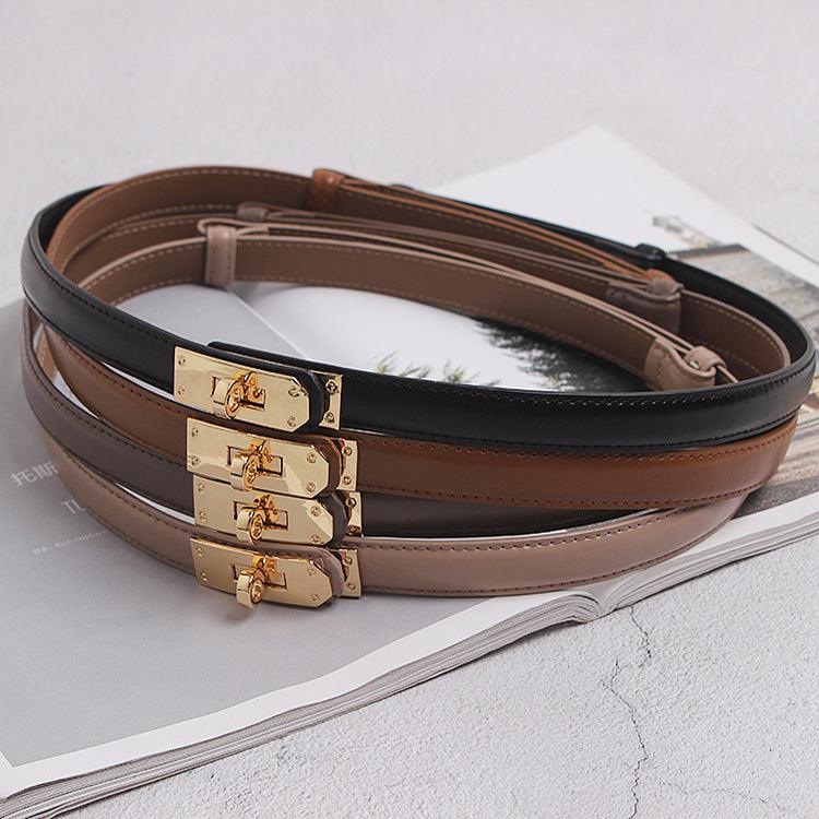 Belted Women Accessorize With Skirt And Sweater - melvincucci