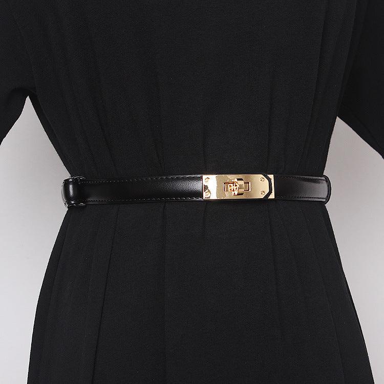 Belted Women Accessorize With Skirt And Sweater - melvincucci