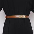 Belted Women Accessorize With Skirt And Sweater - melvincucci