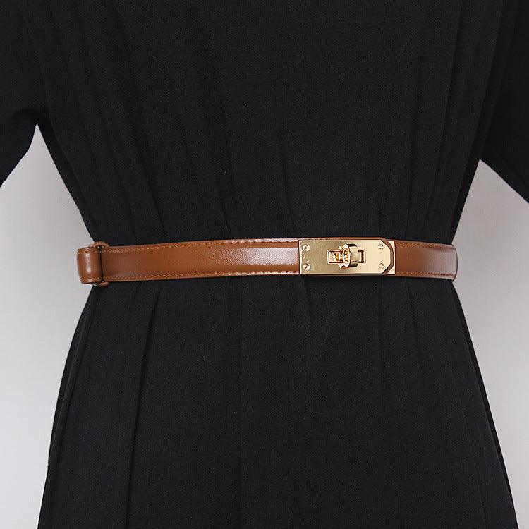Belted Women Accessorize With Skirt And Sweater - melvincucci