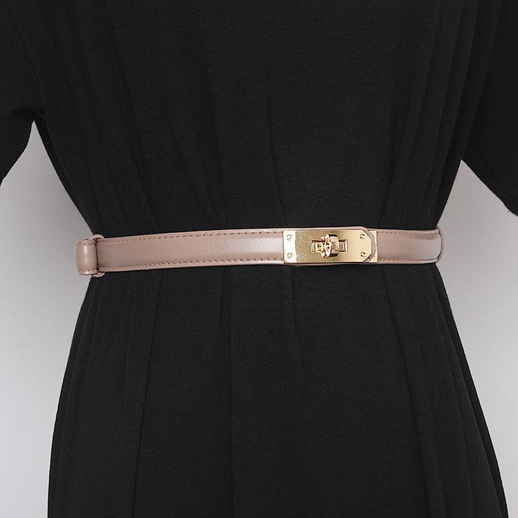 Belted Women Accessorize With Skirt And Sweater - melvincucci