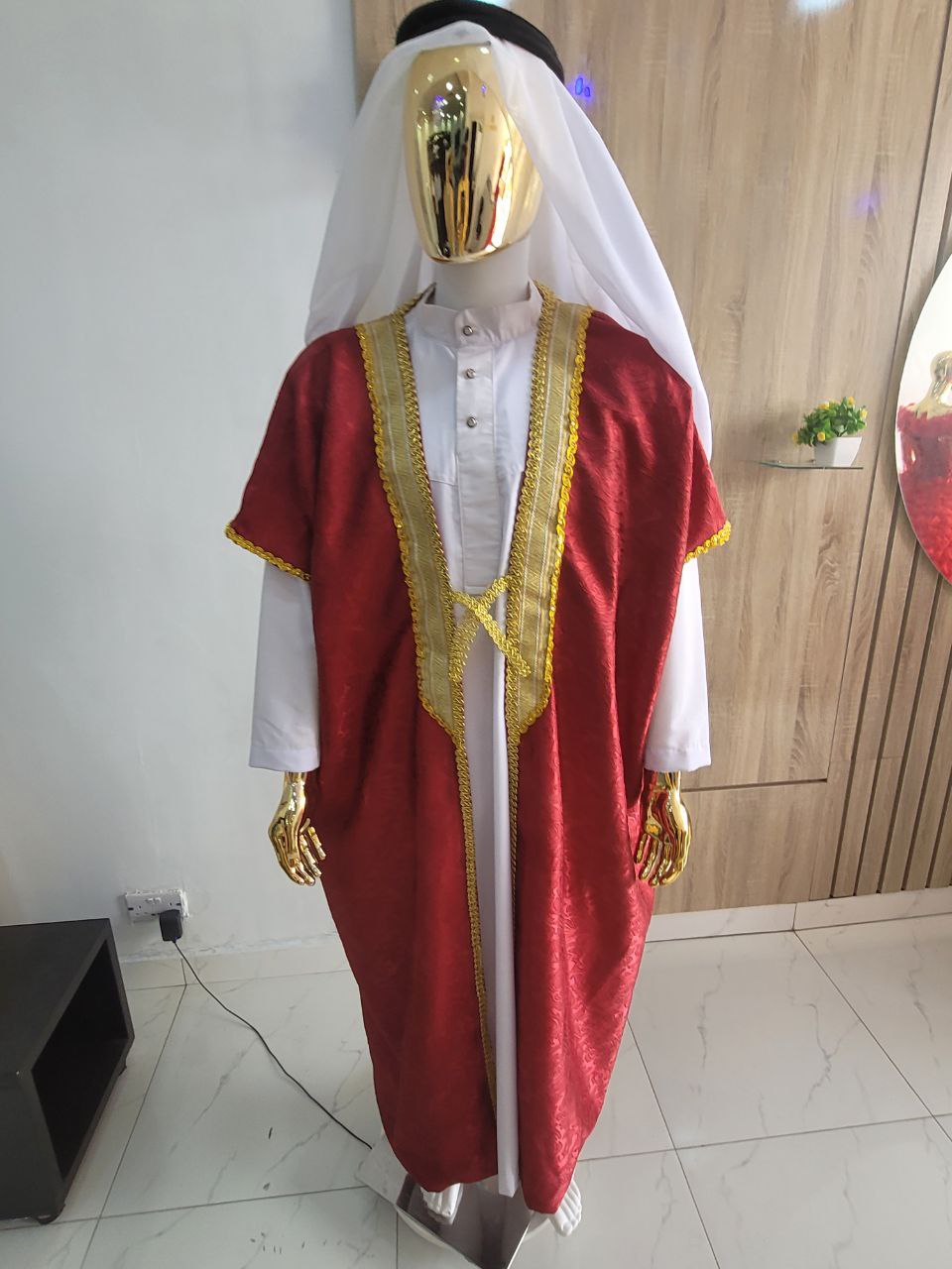 Stunning red bisht, paired with a classic jalabia and an authentic Arab scarf