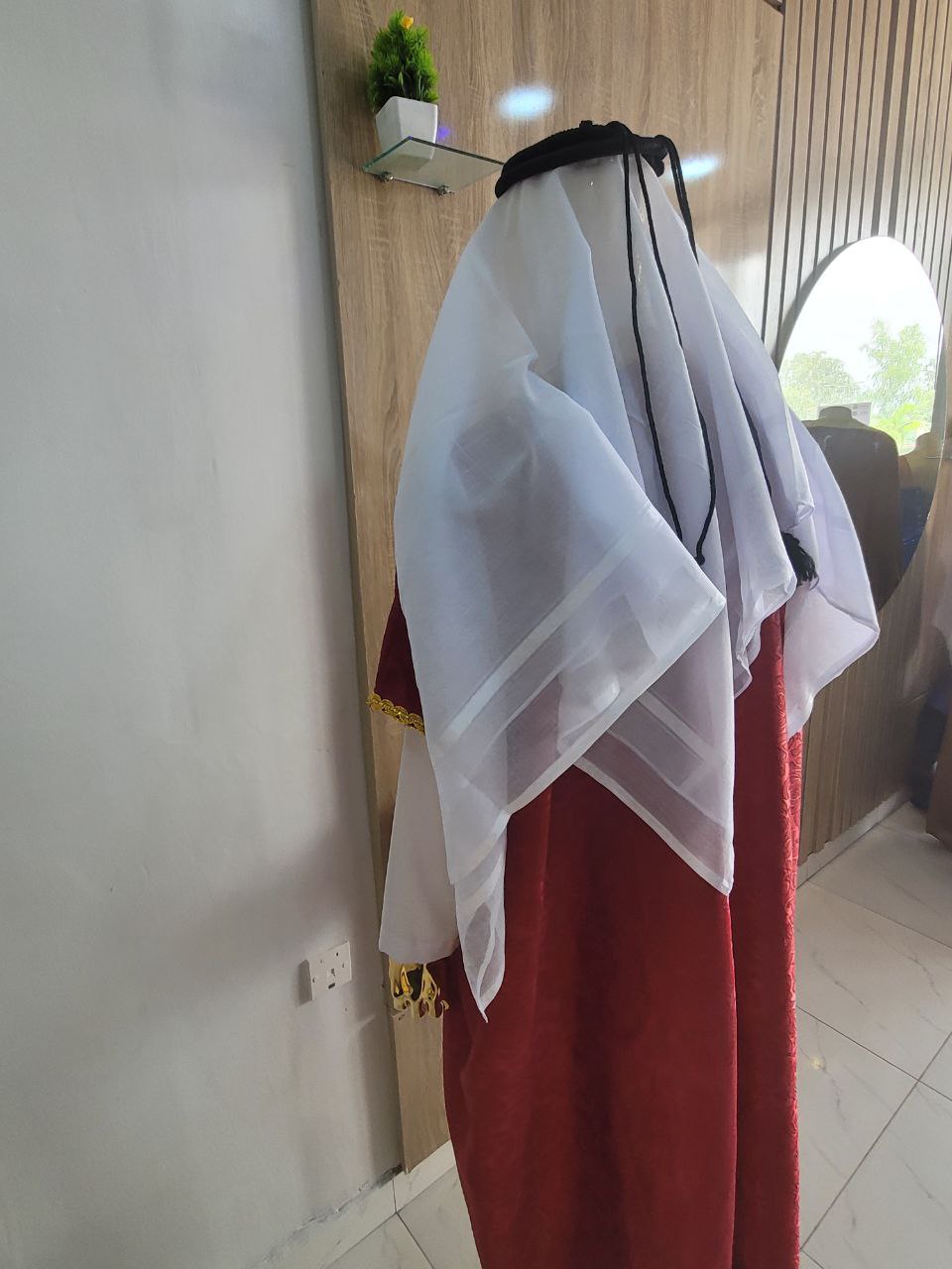 Stunning red bisht, paired with a classic jalabia and an authentic Arab scarf