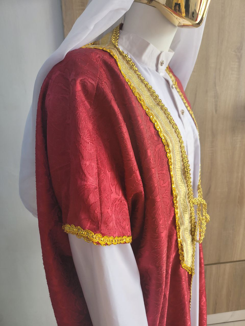 Stunning red bisht, paired with a classic jalabia and an authentic Arab scarf