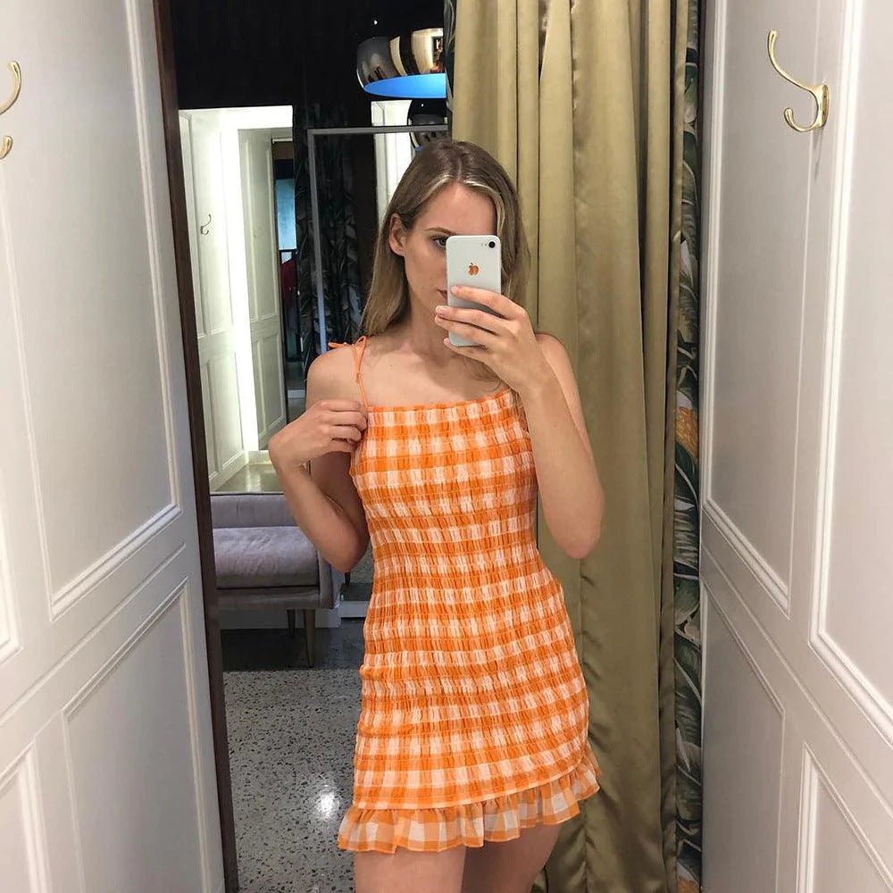 Plaid pleated dress with halter strap - melvincucci