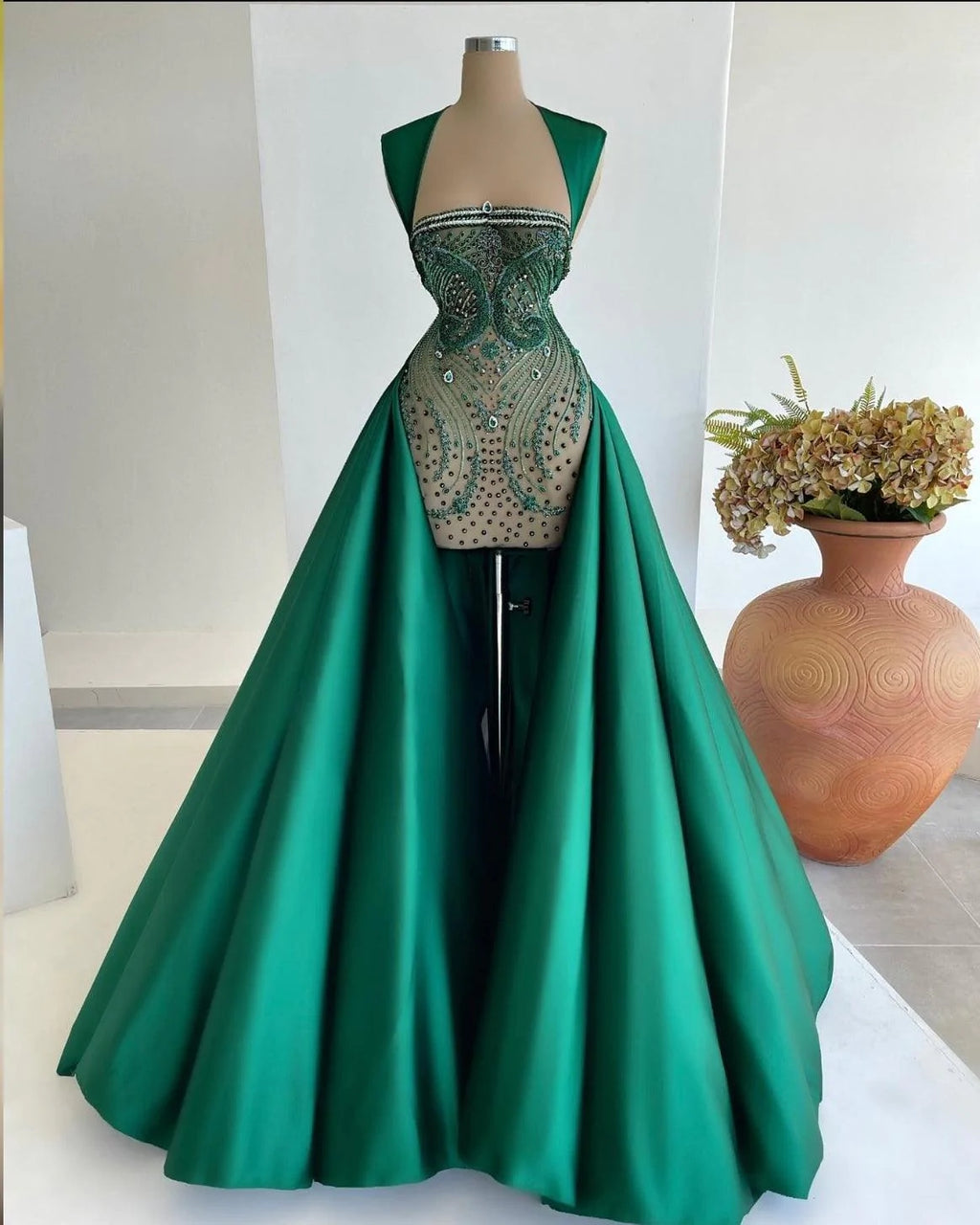 The “Gia” Haute Couture green dress - melvincucci