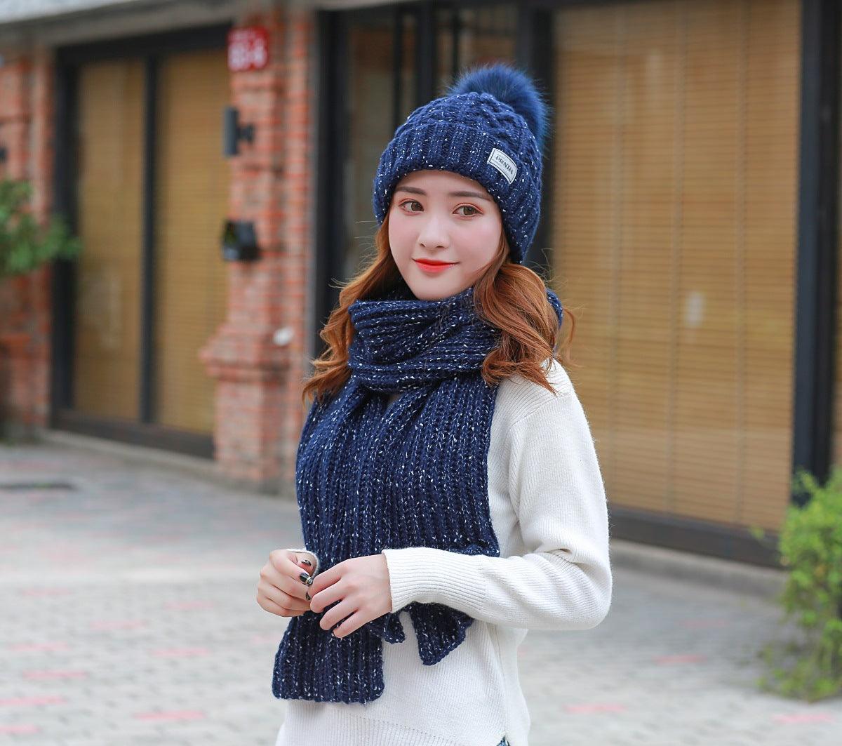 Women knitting wool hat and long scarf - melvincucci