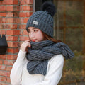Women knitting wool hat and long scarf - melvincucci